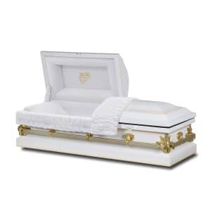 An open white casket with gold accents and ornate detailing is shown. The interior is lined with white fabric, and a white coverlet is partially draped over the side.