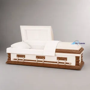 Cream and mahogany solid wood casket with brass handles and ivory interior