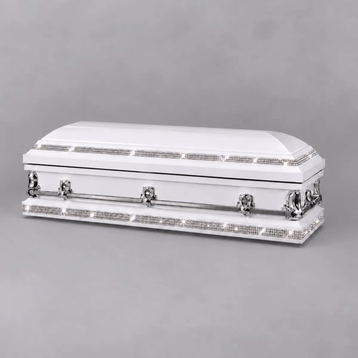 Rhinestone Royalty Custom Casket – Closed View Closed Rhinestone Royalty Custom Casket with silver rhinestone trim and polished silver hardware